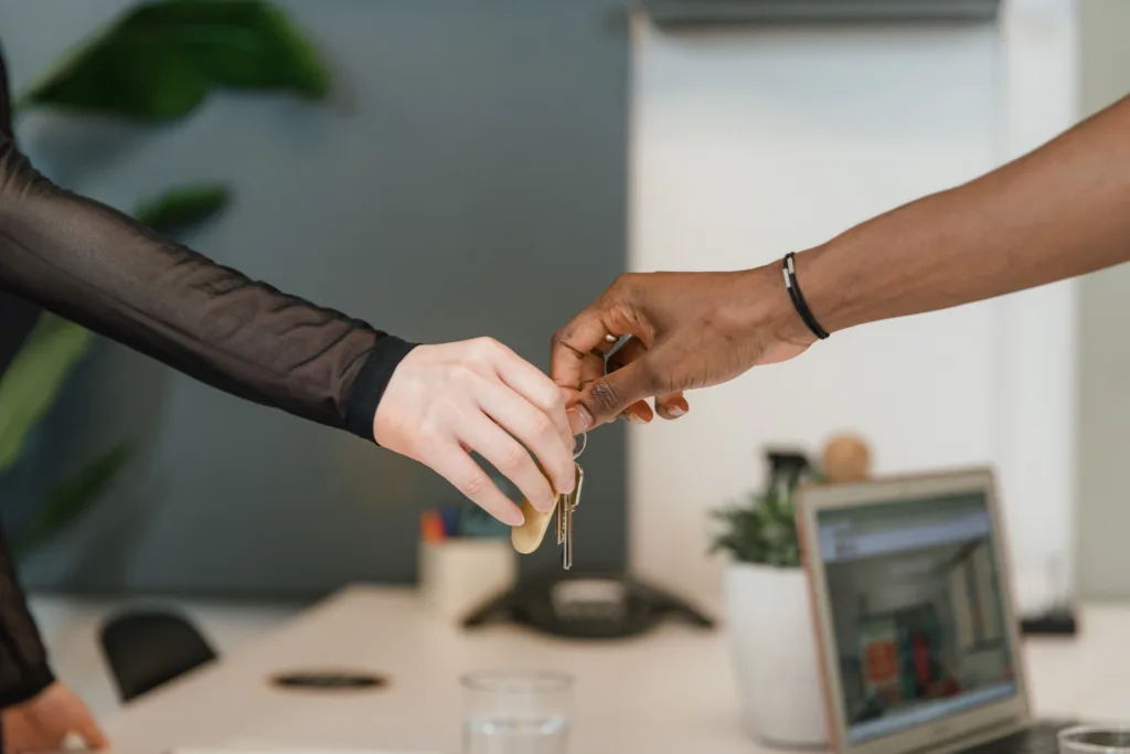 Handing over car keys for a self-drive rental