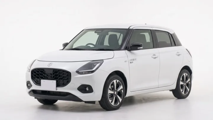 Suzuki Swift, white hatchback, studio photograph on a plain background
